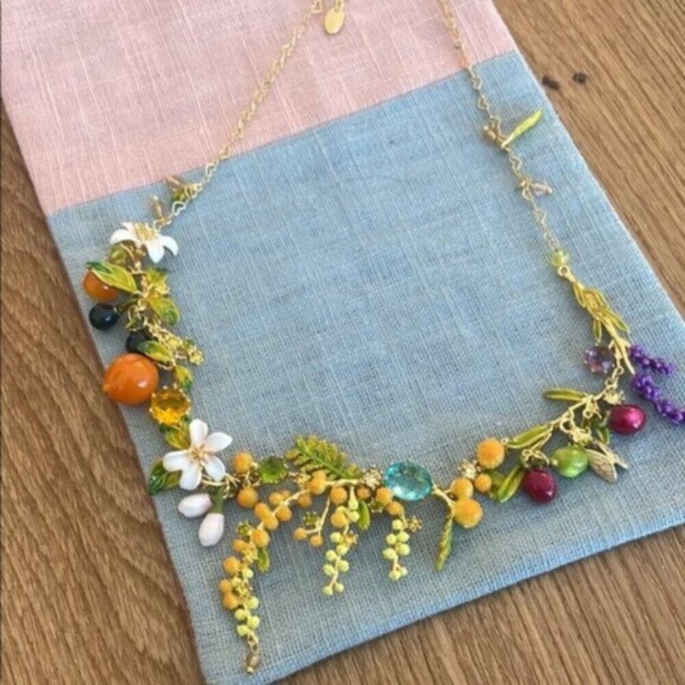 LES NEREIDES AGold and Green Botanical Necklace with Crescent Design